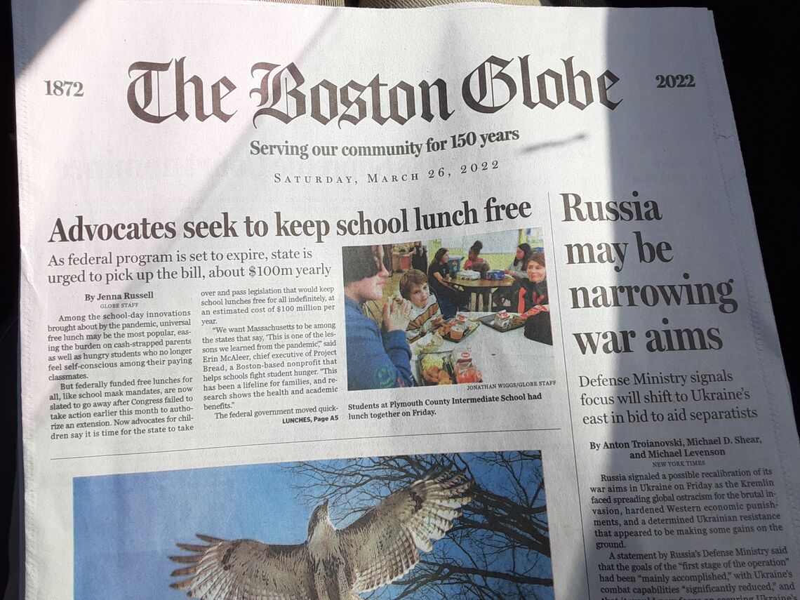 Copy of Boston Globe featuring article on Feed Kids Campaign